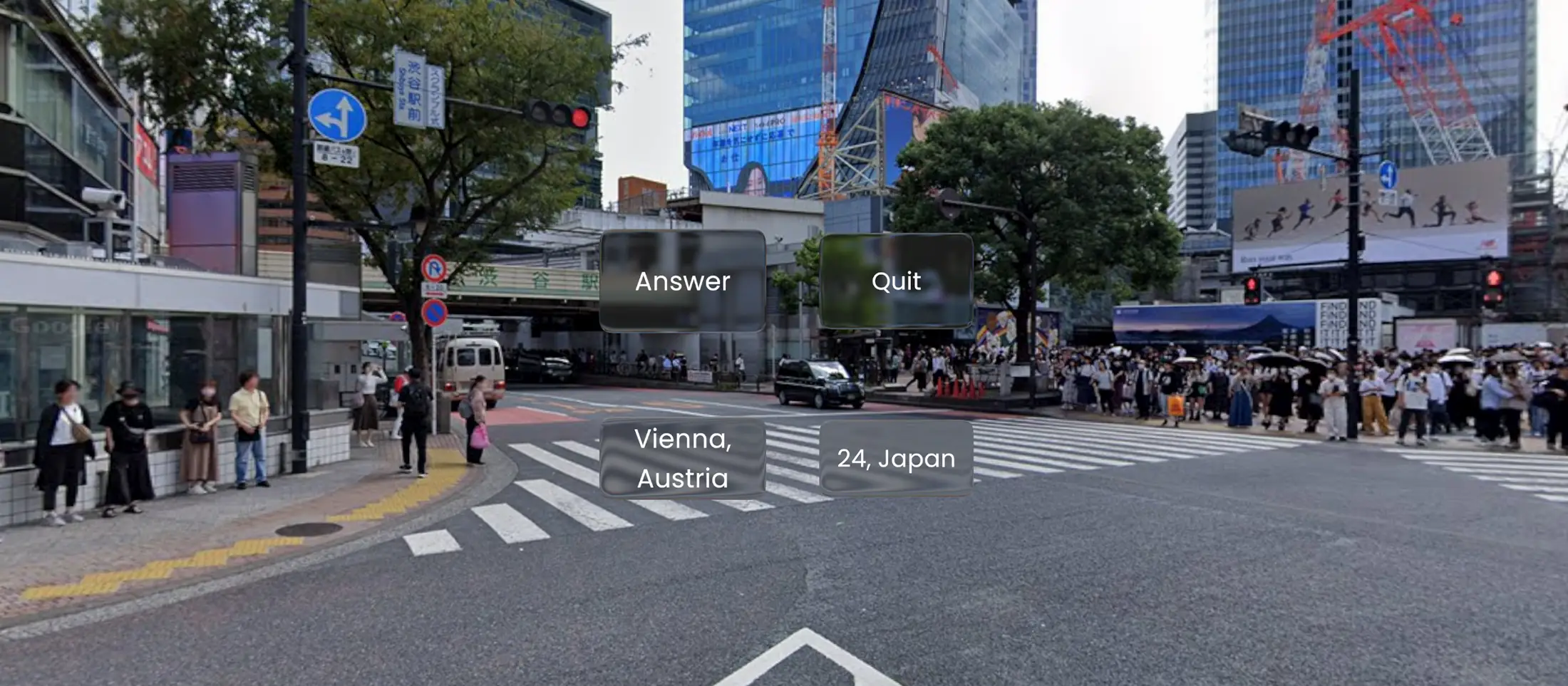 A 360-degree street view of a busy city crossing with shop signs.